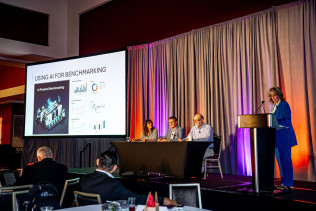 Elisha Kasinskas (right) moderated the panel discussion on AI featuring (from left): Ricoh's Heather Willovit, Konica Minolta's Dr. Mark Bohan, and Canon's Bob Barbera.