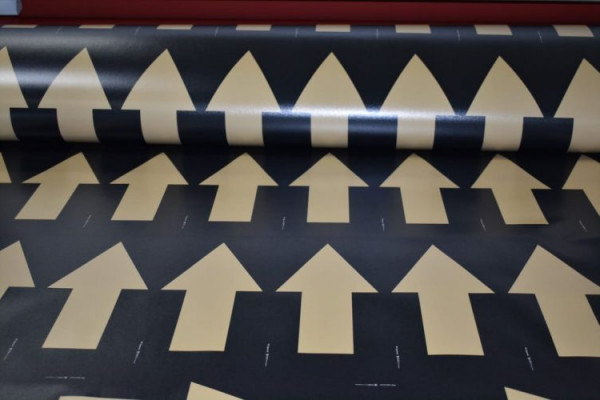 Vanderbilt University Printing Services employees print directional signage for university buildings.