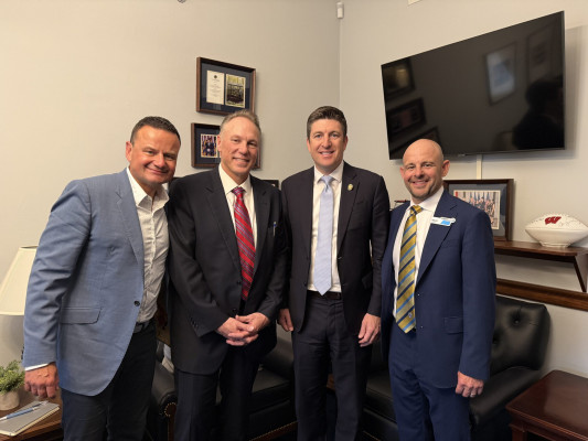 From left: Brian Adam (Olympus Group), Eric Blohm (Freedom Graphic Systems), Rep. Bryan Steil of Wisconsin, and Dave Leskusky (PRINTING United Alliance).